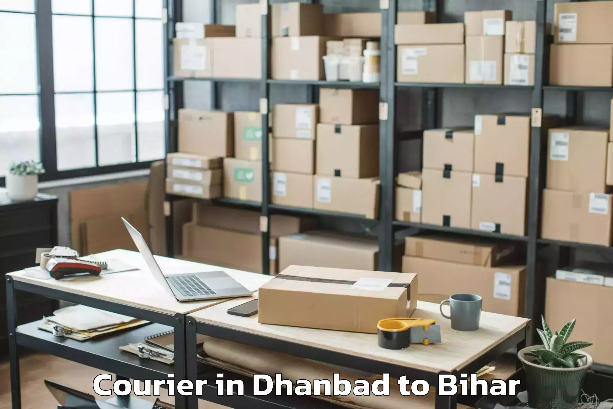 Trusted Dhanbad to Chautham Courier